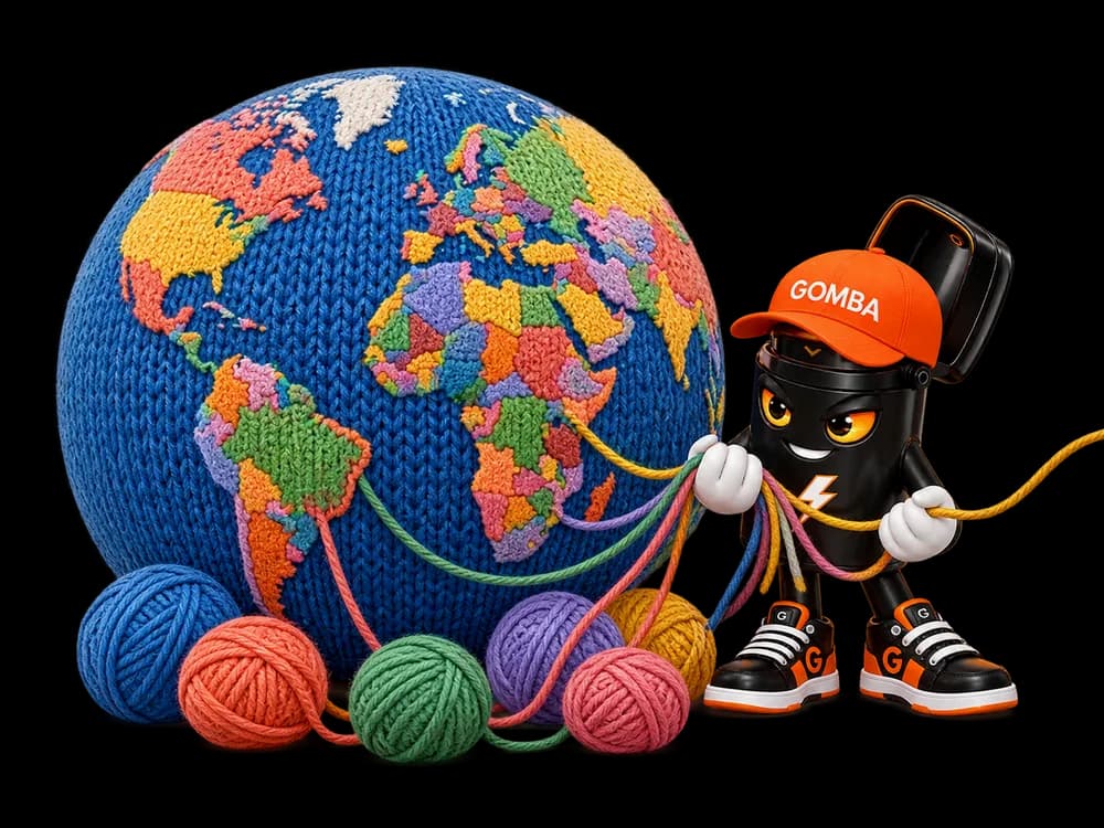 GOMBA arranging colorful yarn strands connected to a globe knitted from different-colored country patches