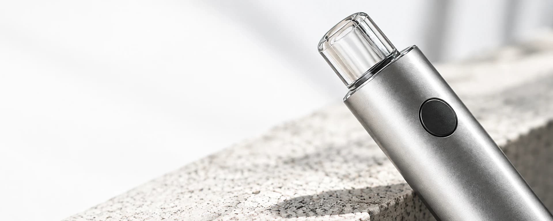 Concept visualization of a silver vaporizer exterior with a clear mouthpiece